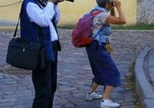 туристы с фотоаппаратами