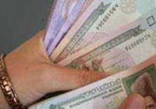 гривны в руке